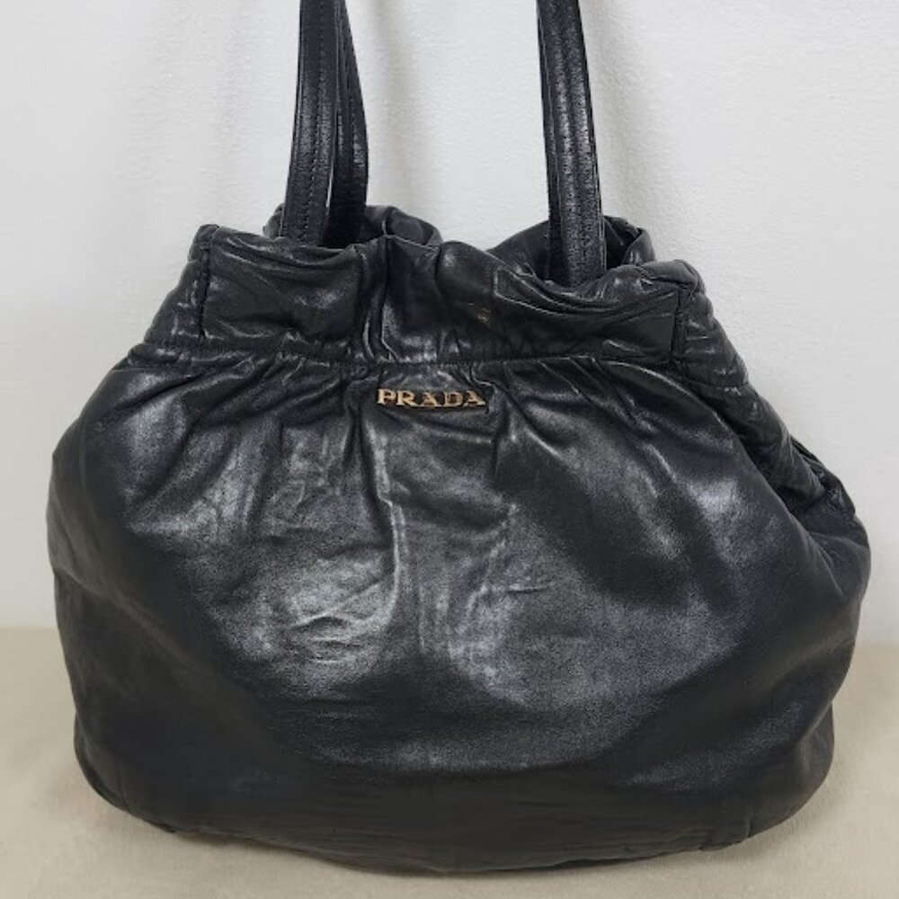 Prada Nappa Bow Bag. Great shoulder drop. Soft leather. Bows have been removed.